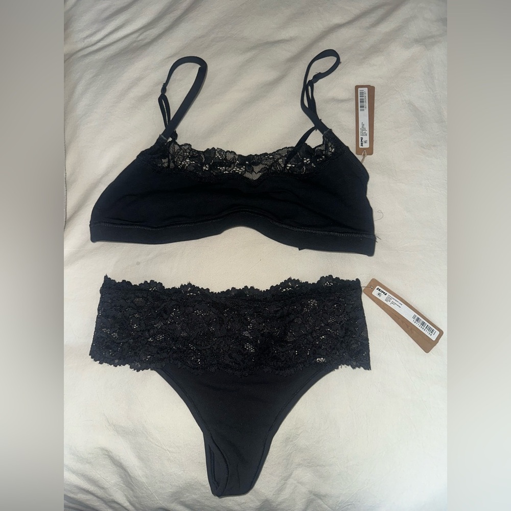 SKIMS Black Lingerie Set. Lace scoop neck bralette & lace thong.
